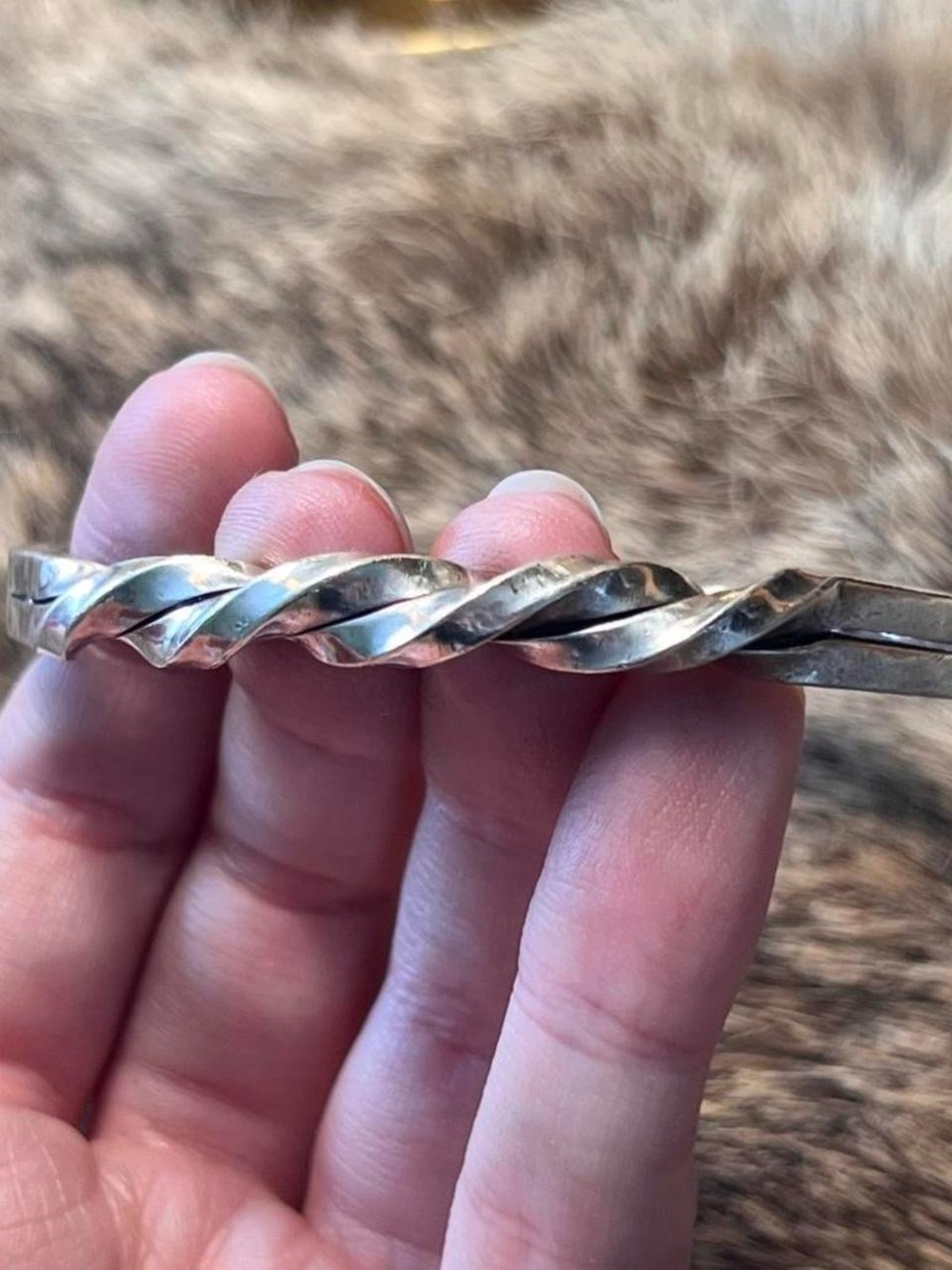 Sterling silver Pepe and Maureen twisted bangle bracelet